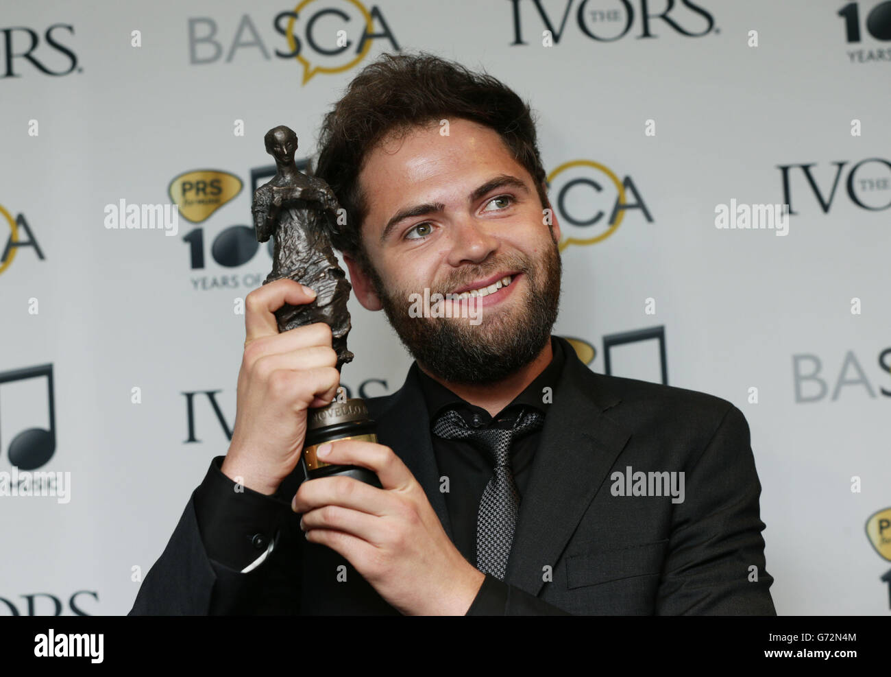 Mike Rosenberg of Passenger with his PRS for Music Most Performed Work award, at the 59th annual Ivor Novello Awards, at Grosvenor House, London. Stock Photo