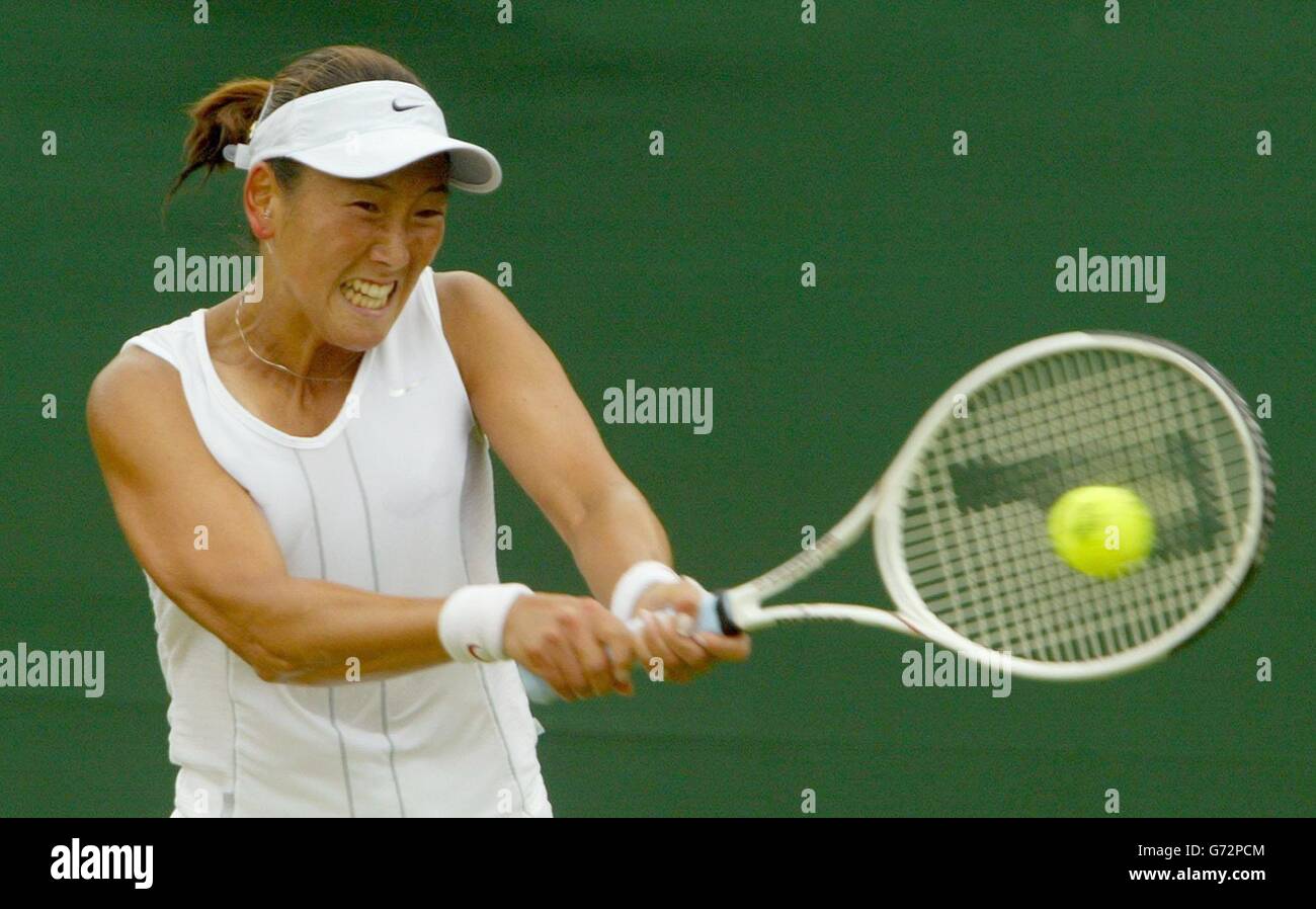 Ai Sugiyama from Japan in action against Tamarine Tanasugarn from Thailand at the Lawn Tennis Championships in Wimbledon, London. Sugiyama won in straight sets 3:6/7:5. , NO MOBILE PHONE USE. Stock Photo