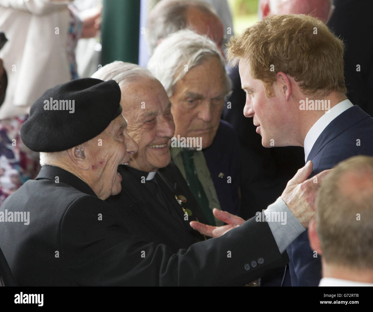 Prince Harry attends the British commemoration reception at the Hotel Rocca in Cassino and speaks with WWII veterans; the event commemorates the 70th Anniversary of the Battles of Monte Cassino, acknowledging the British and Commonwealth contribution to the successful conclusion of the battles in this area. Stock Photo