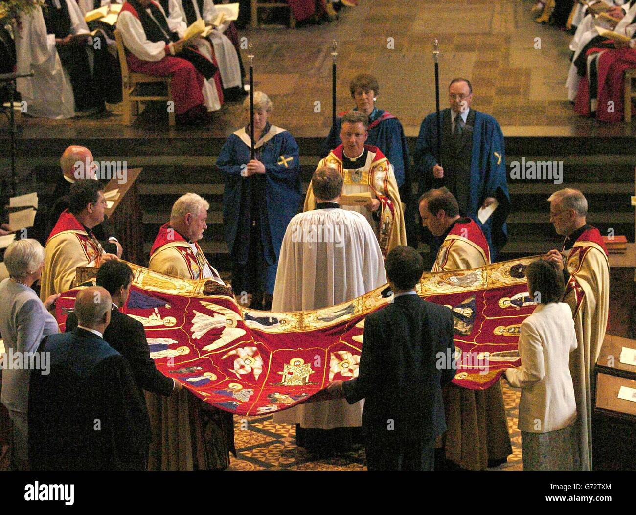 The new Dean of St Albans, Canon Jeffrey John, is clothed in the Alban