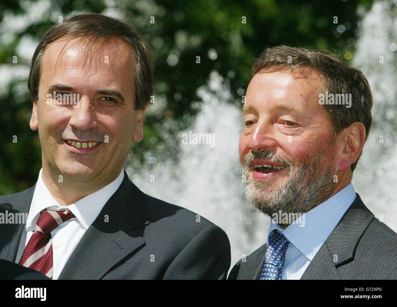 Home Secretary David Blunkett (right) stands with Spanish Minister of the Interior Jose Antonio Alonso Suarez at Sheffield City Square, prior to a meeting of their counterparts from France, Germany and Italy in a bid to increase cross-border cooperation. The two-day informal summit is also looking at methods of tracking the flow of cash that ends up financing al Qaida and other groups, and of tackling the use of false papers. Stock Photo