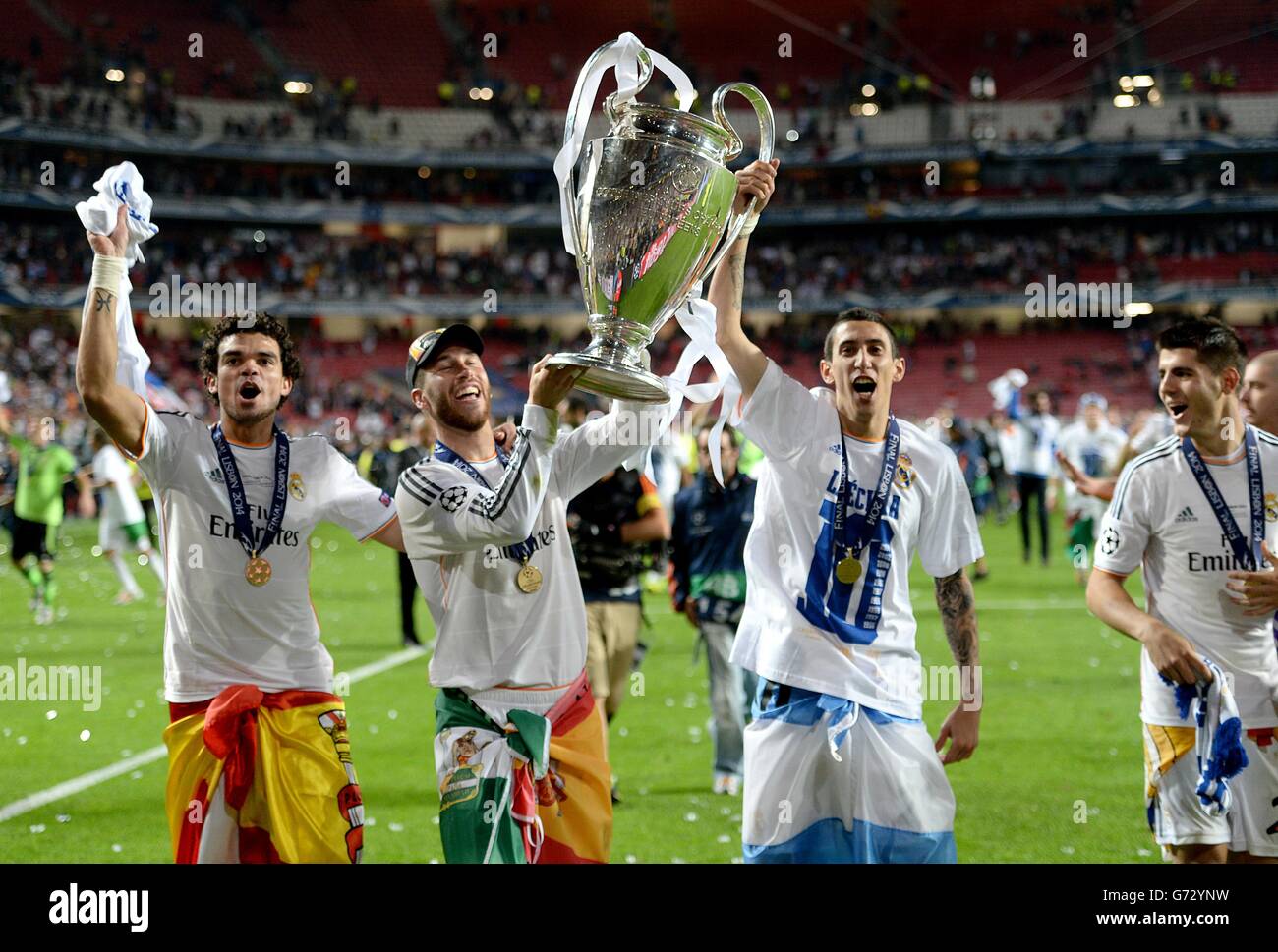 (L-R) Real Madrid's Marcelo, Sergio Ramos, Angel di Maria and Alvaro Morata celebrate with the UEFA Champions League trophy after the game Stock Photo