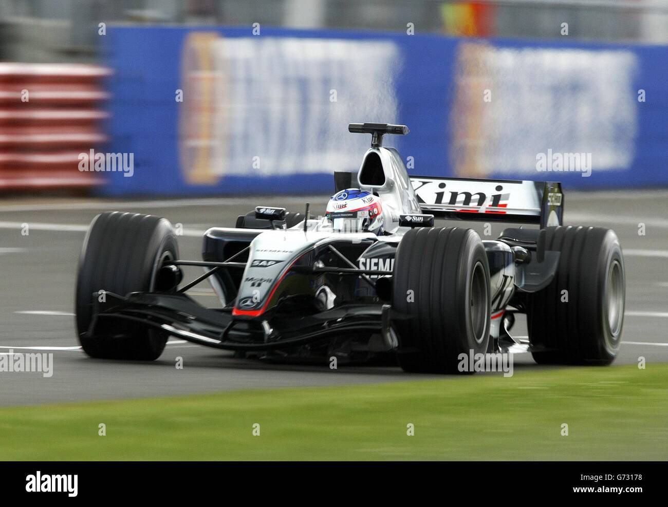 Finland's driver Kimi Raikkonen goes past the finishing line during qualifying at Silverstone, Northamptonshire, ahead of tomorrow's British Grand Prix. Stock Photo