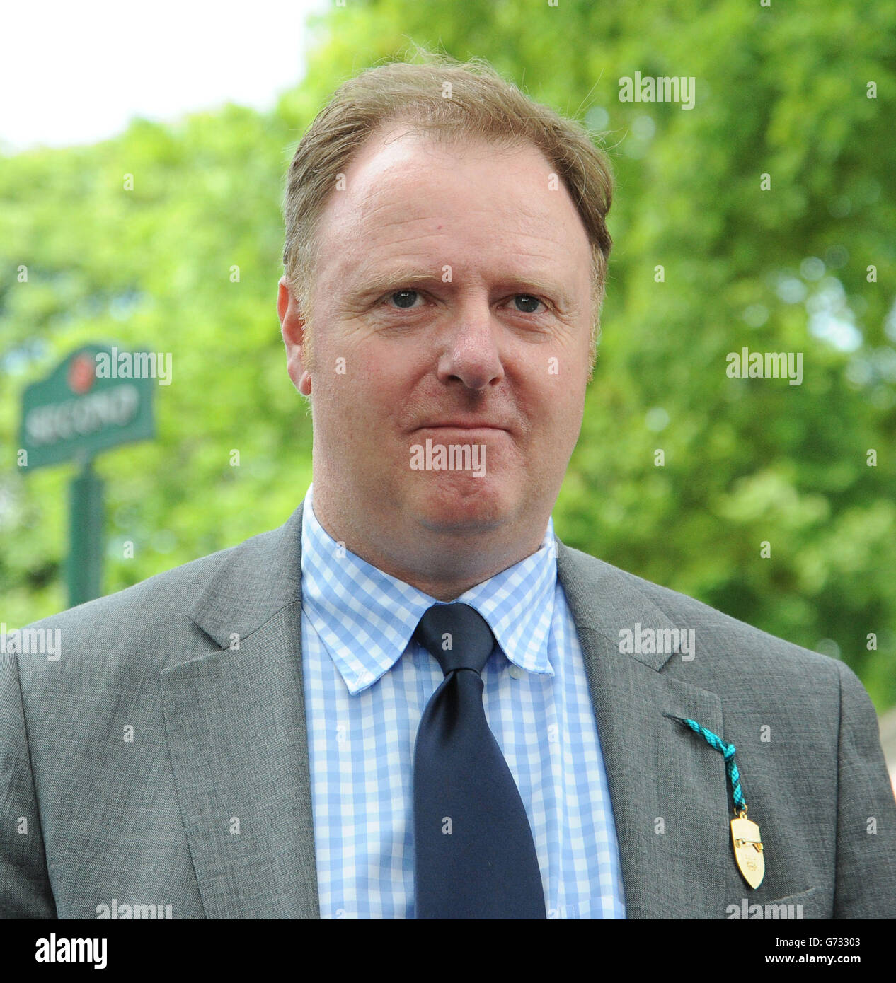 Winning trainer Ed McMahon after Aeolus wins the New Timeform Flags Sandy Lane Stakes during the Sandy Lane Stakes day at Haydock Park Racecourse. Stock Photo