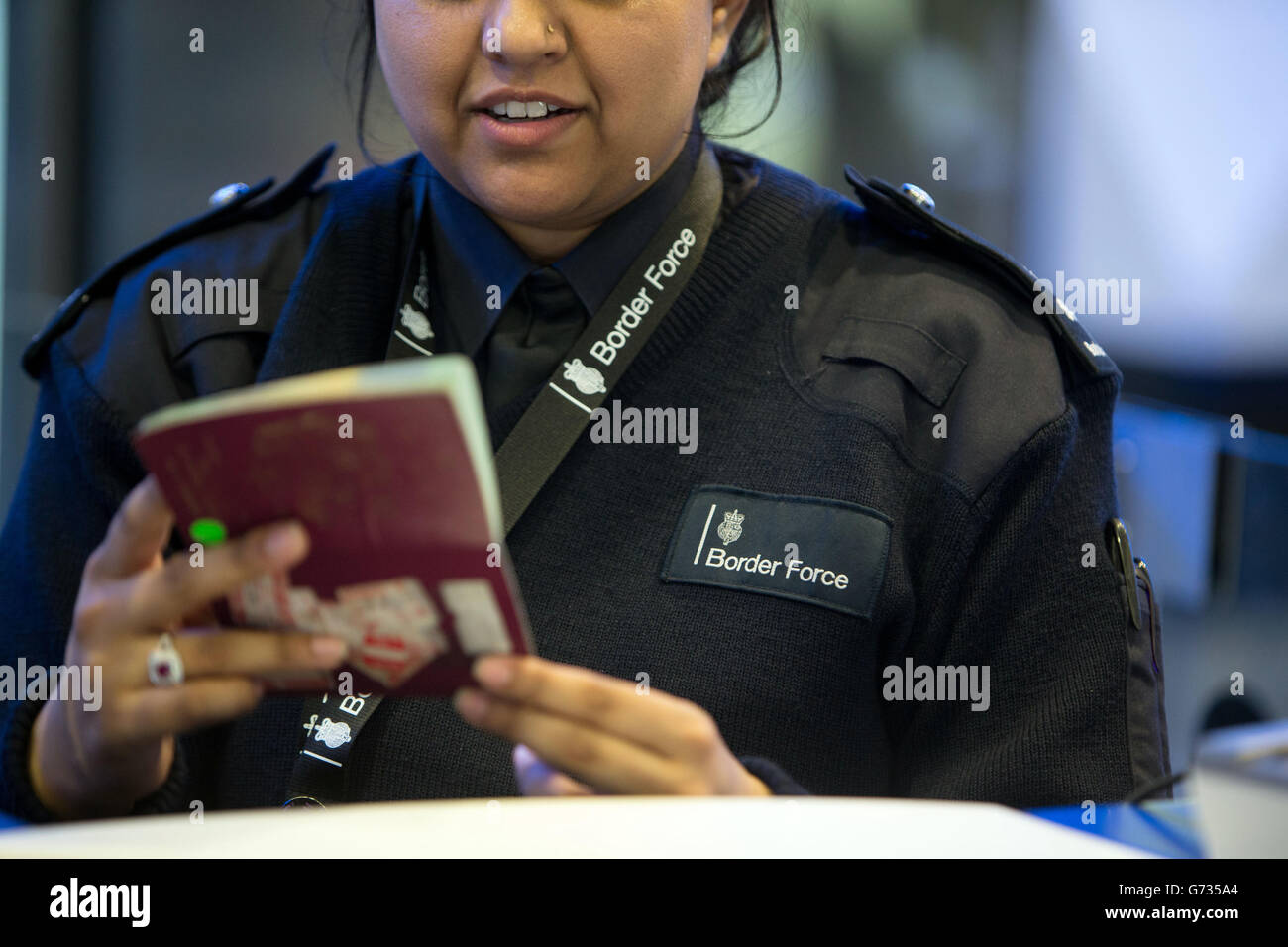 Officer passport airport hires stock photography and images Alamy