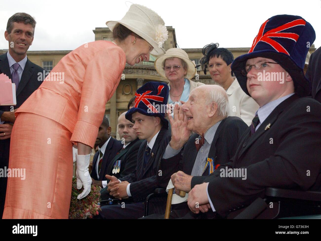 The Princess Royal meets Henry Allingham (right), (aged 108) during a garden party at Buckingham Palace, central London. Two First World War veterans were the toast of Buckingham Palace today as the distinguished servicemen made their appearance at a Royal garden party. Henry Allingham, 108, and William Stone, 103, were among those who met the Princess Royal, patron of the Not Forgotten Association, which was set up for ex-service disabled. Stock Photo