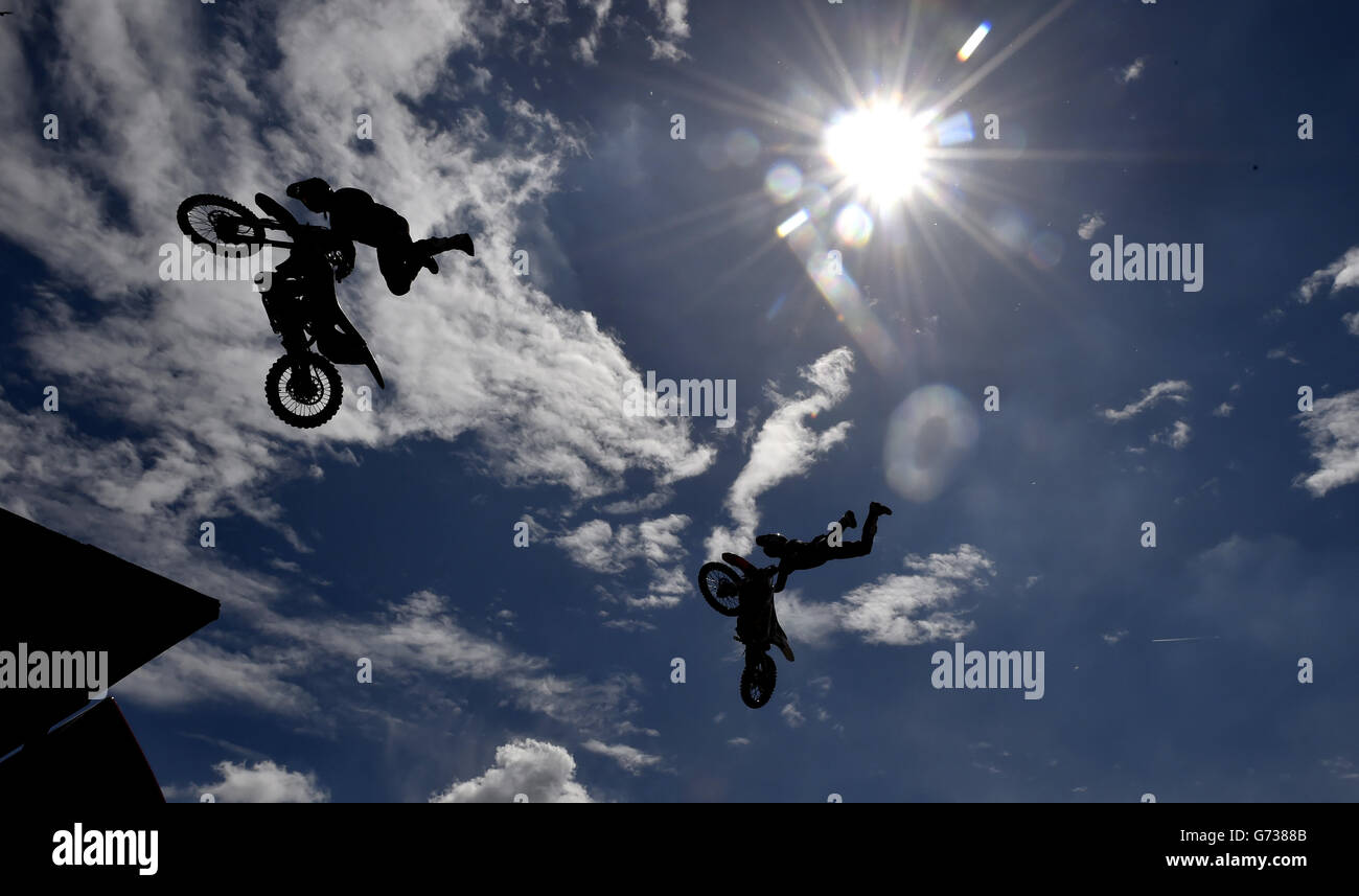 Stunt riders with motorbikes perform during the Extreme Torque Show at the Nissan Plant, Sunderland. Stock Photo