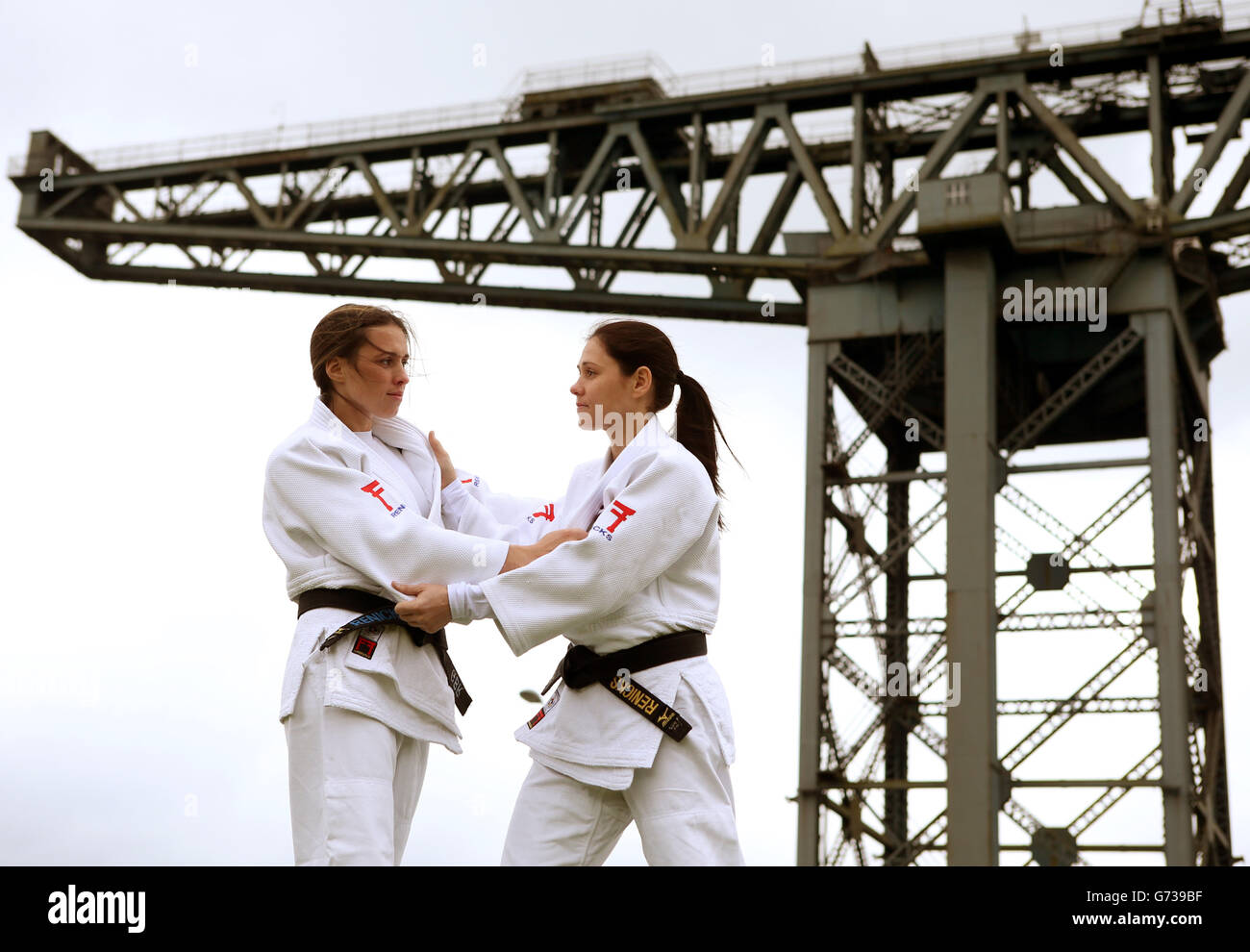 Scotland's Judo Athletes sisters (left) Kimberley and Louise Renicks beside the Finnieston Crane as they are announced as part of Team Scotlland for the Commonwealth Games during the photocall at The Hydro, Glasgow. PRESS ASSOCIATION Photo. Picture date: Wednesday May 28, 2014. See PA story SPORT Scotland. Photo credit should read: Andrew Milligan/PA Wire Stock Photo