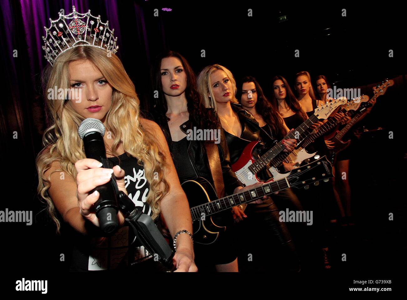 (Left to right) The current Miss England Kirsty Heslewood, 25, with finalists Miss English Riviera, Leanne Ward, 24, Miss Cheltenham, Sophie Smith, 23, Miss Leicestershire, Holly Desai, 22, Miss Bedfordshire, Jasmine Chavda, 23, Miss London, Tammy Dexter, 20 and Miss Cambridgeshire Carina Tyrrell, 24, during a rock themed Miss England 2014 photocall at the Hippodrome Theatre, London. Stock Photo