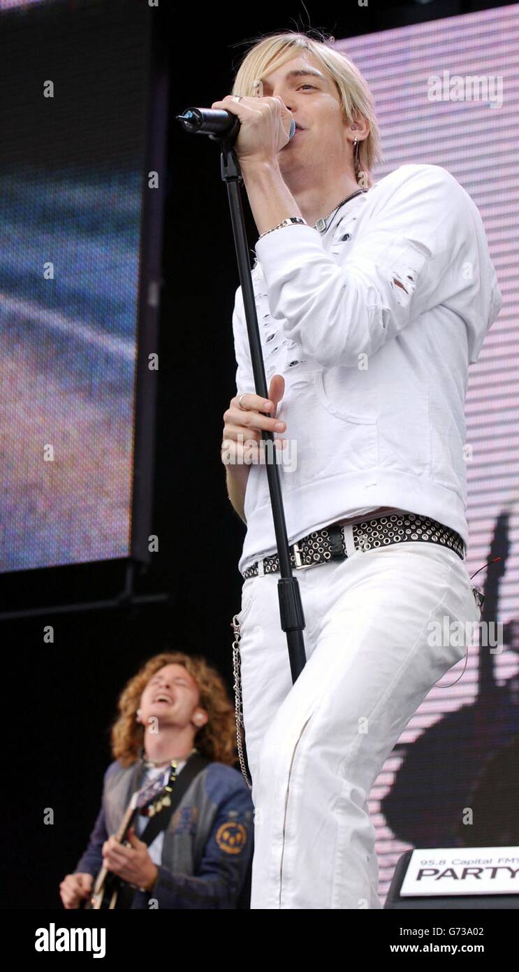 . . Lead singer of the rock group The Calling, Alex Band, performs onstage during the Capital Radio Party In The Park concert, held at Hyde Park, central London in aid of The Prince's Trust Stock Photo