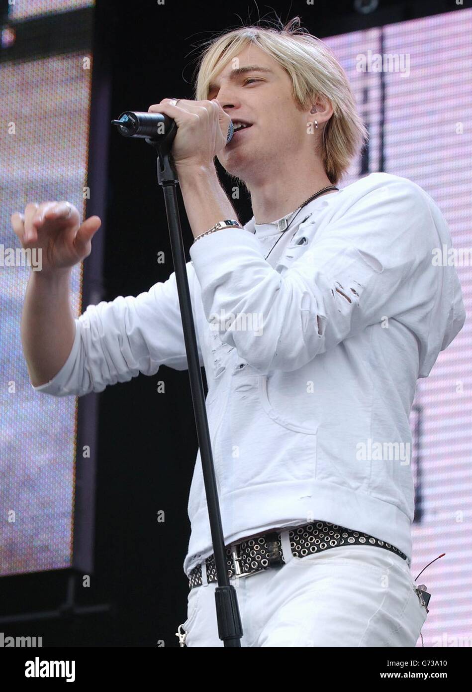 . . Lead singer of the rock group The Calling, Alex Band, performs onstage during the Capital Radio Party In The Park concert, held at Hyde Park, central London in aid of The Prince's Trust Stock Photo
