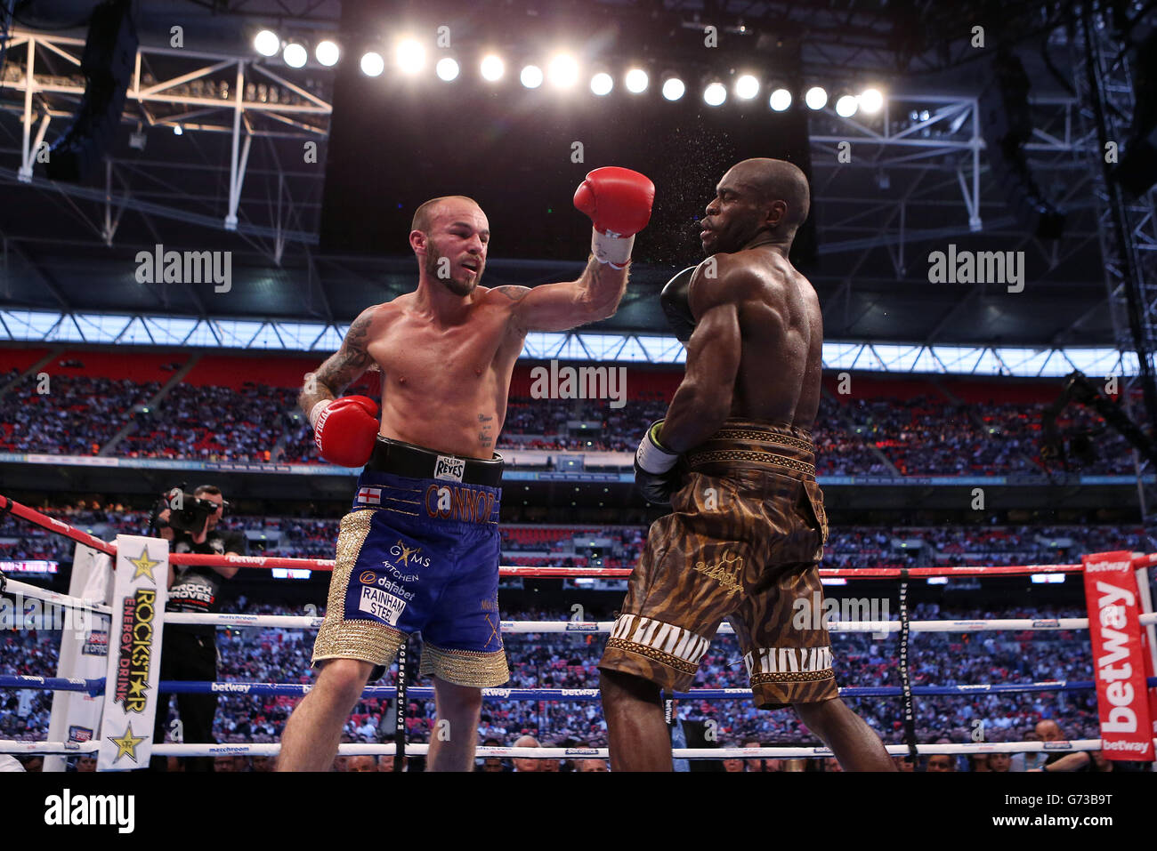 Kevin Mitchell celebrates defeating Ghislain Maduma in their Lightweight  bout at Wembley Stadium, London Stock Photo - Alamy