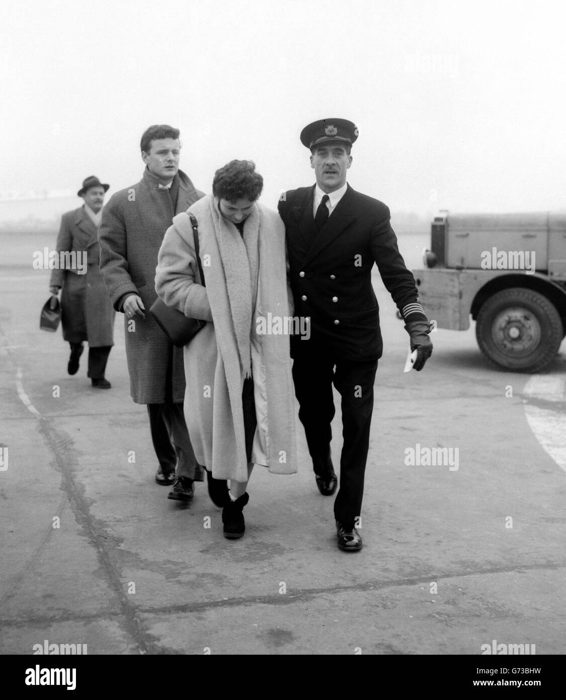 Accompanied by an Air Steward Miss Leach friend of Manchester United Accompanied by an Air Steward Miss Leach friend of Manchester United