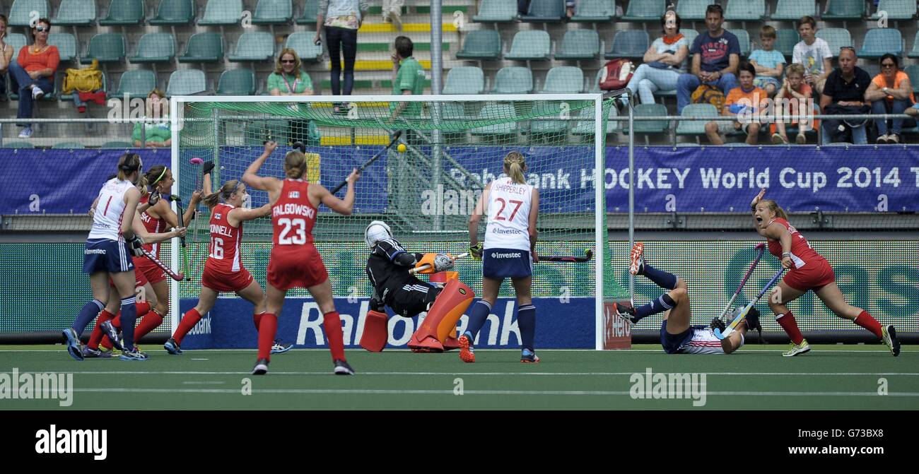 USA's Kelsey Kolojejchick scores their second goal in their opening game in the Rabobank Hockey World Cup at the Kyocera Stadium, Den Haag, Netherlands. Stock Photo