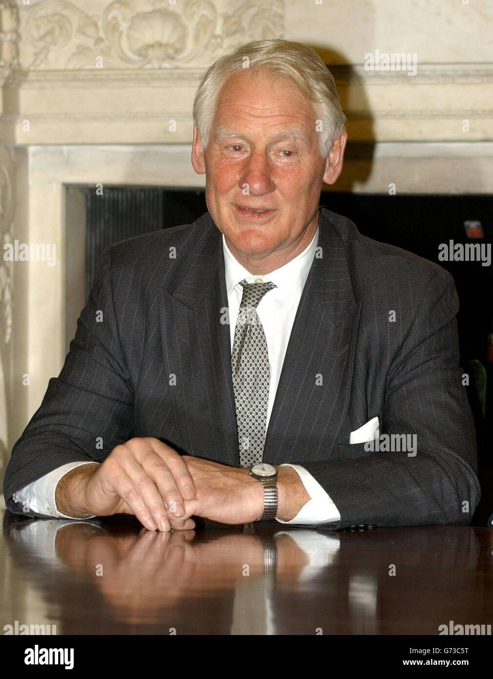 Lord Butler of Brockwell, the Chairman of the Commitee to Review Intelligence on Weapons of Mass Destruction, in London. Lord Butler is due to publish his report into the use of intelligence on weapons of mass destruction in the run-up to the war with Iraq at 12.30pm Wednesday July 14, 2004. Stock Photo