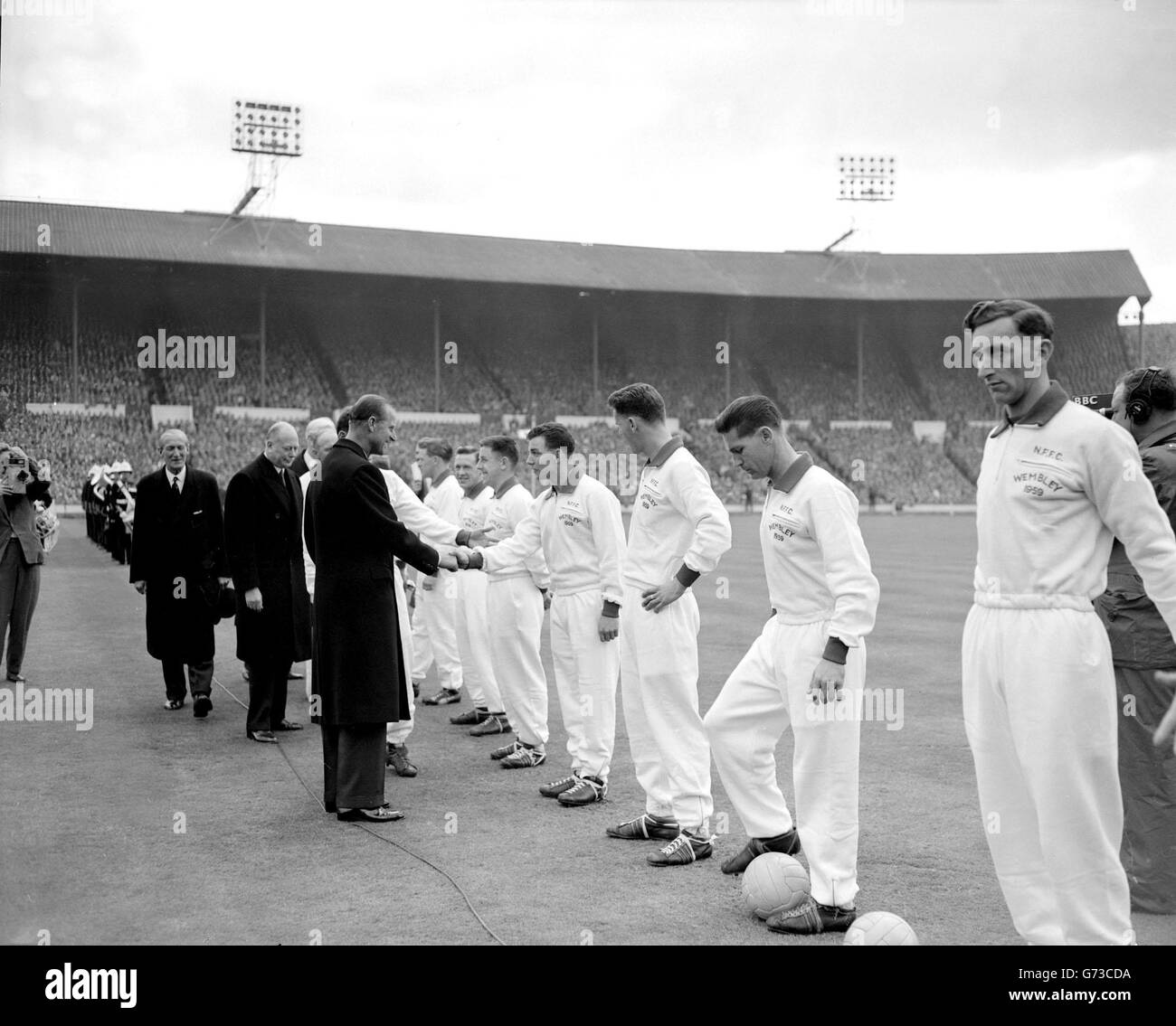 The Duke of Edinburgh meets members of the Nottingham Forest team before the kick-off in the FA Cup Final against Luton Town at Wembley. Forest won the cup with a 2-1 victory. Stock Photo