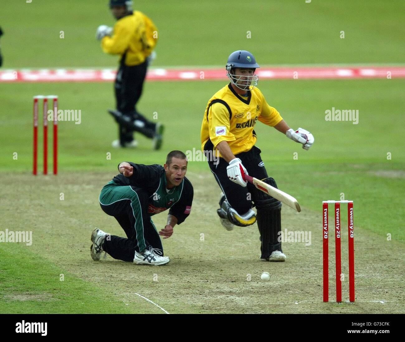 Worcestershire's Andrew Hall (left) attempts to run out Glamorgan's Darren Thomas during the Twenty 20 Cup match at New Road, Worcester. Stock Photo
