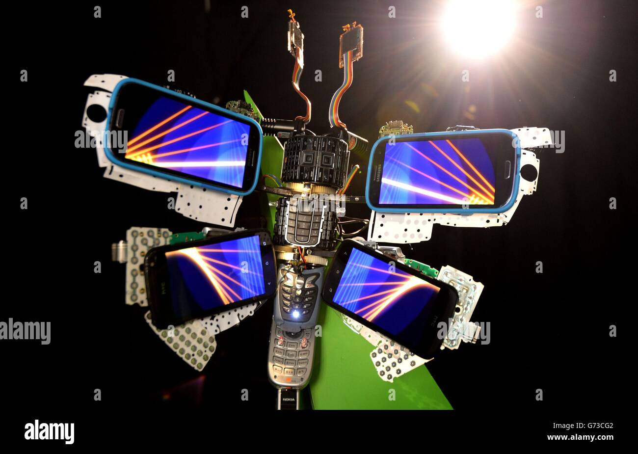 Mobile Phones re-born as Digital Butterflies Stock Photo - Alamy