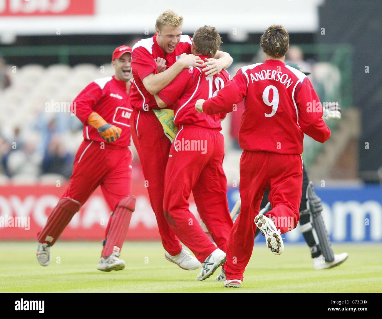 Lancashire Lightning's Dominic Cork (back to camera) celebrates taking