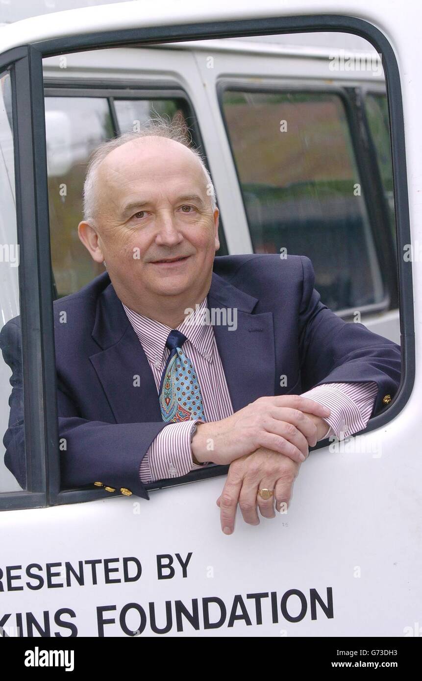 American Gregory Pischea, from Grosse Point, Michigan, at the Flying Bull Primary School in Portsmouth, Hants. Mr Pischea, 56, developed a special relationship with the school after reading - on sheet of a local newspaper used to wrap a teapot from the UK he bought on the internet - that its minibus had been vandalised and sending a donation. At the school today he met staff and attended a special assembly being held in his honour, to celebrate the link which has seen Mr Pischea sending donations of books for the school library and pupils writing him letters. Stock Photo