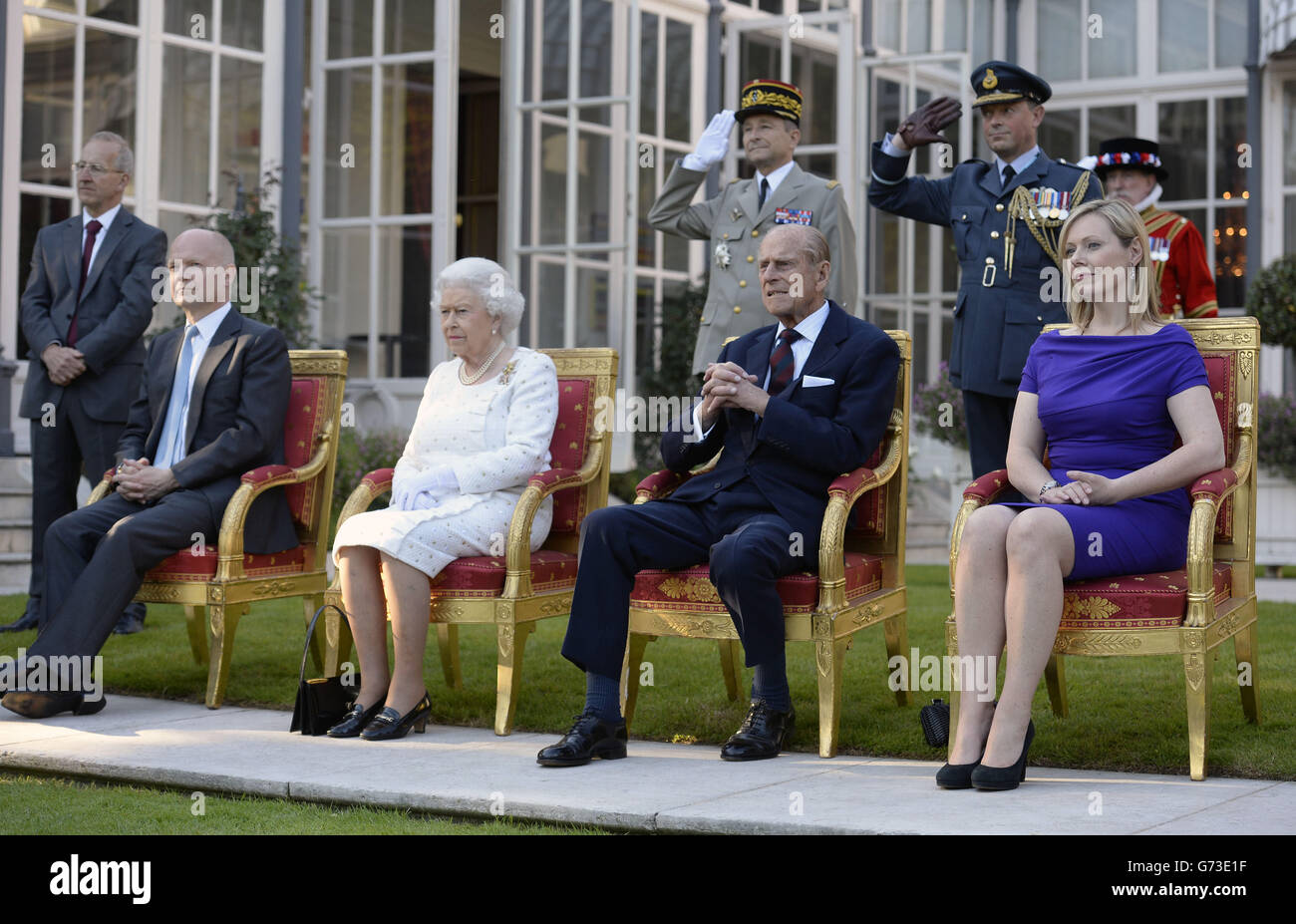 Foreign Secretary William Hague, Queen Elizabeth II, the Duke of Edinburgh and Ffion Hague attend a garden party in Paris, hosted by Sir Peter Ricketts, Britain's Ambassador to France ahead of marking the 70th anniversary of the D-Day landings during World War II. Stock Photo