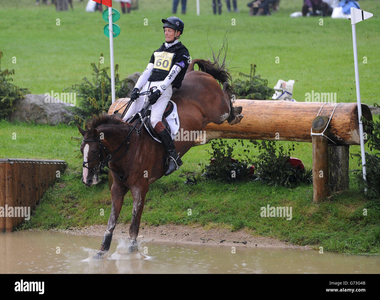William Fox-Pitt riding Chilli Morning competes in the CIC3* cross country event during the Bramham International Horse Trials at Bramham Park, West Yorkshire. Stock Photo