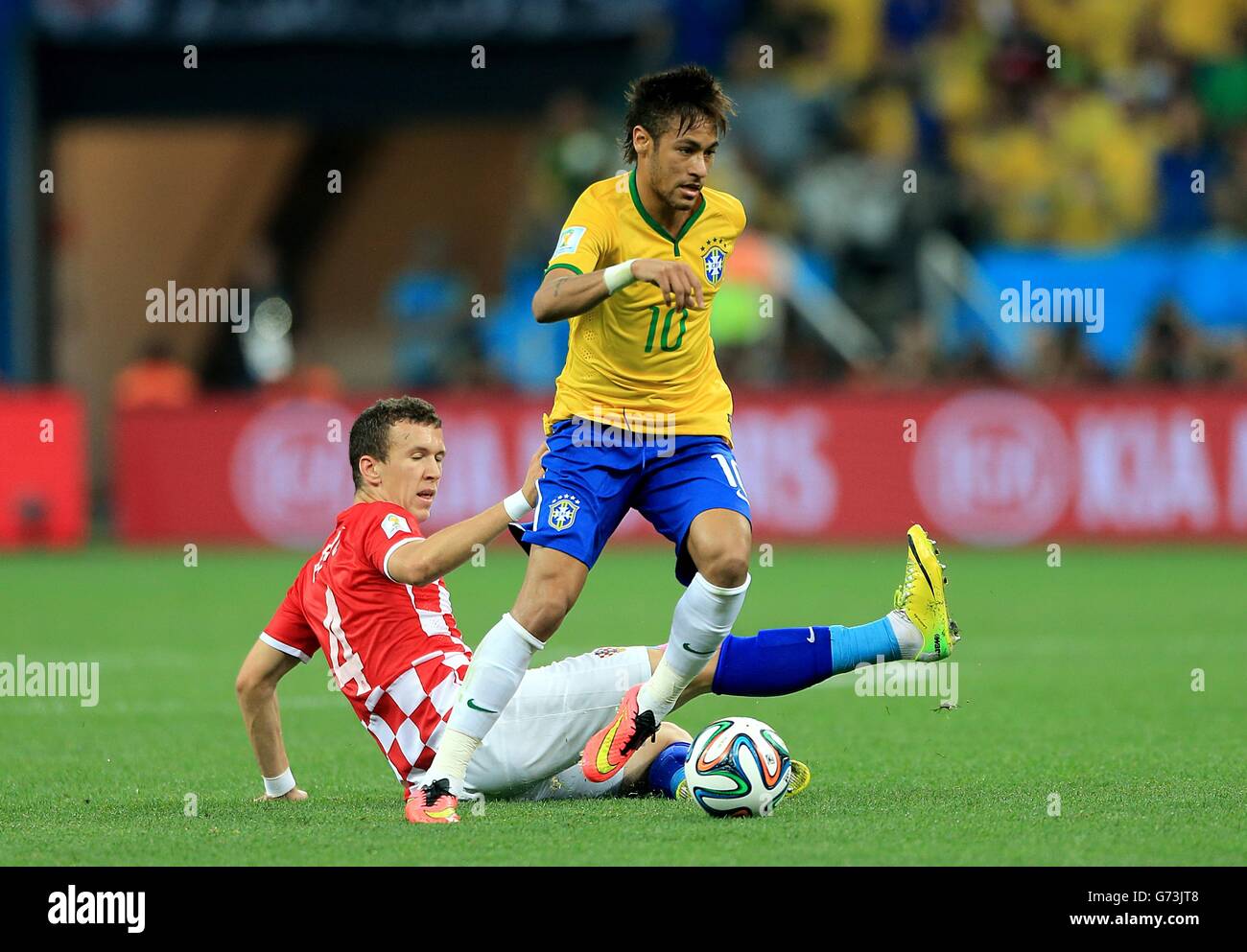 Brazil's Neymar (right) skips past Croatia's Ivan Perisic Stock Photo