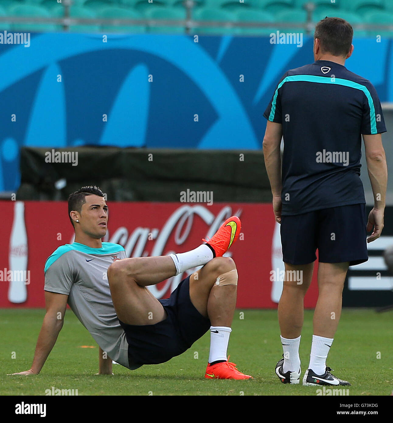 Soccer - FIFA World Cup 2014 - Group G - Germany v Portugal - Portugal Training Session - Arena Fonte Nova. Portugal captain Cristiano Ronaldo speaks with Portugal Manager Paulo Bento during training session ahead of Germany game in Salvador Stock Photo