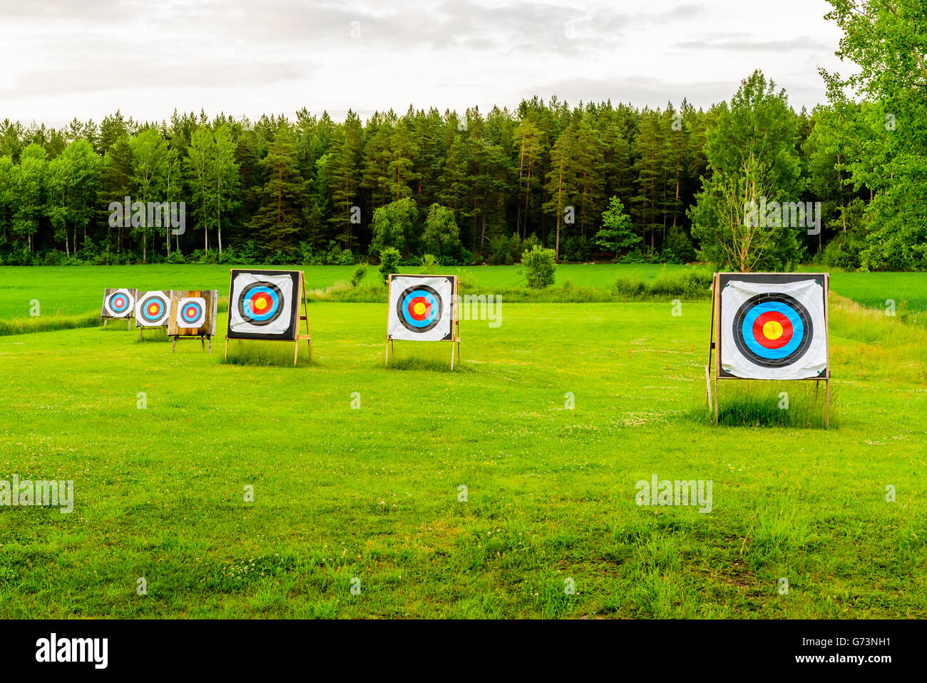Outdoor Archery Targets On Grass Field Surrounded By Forest In The G73NH1 
