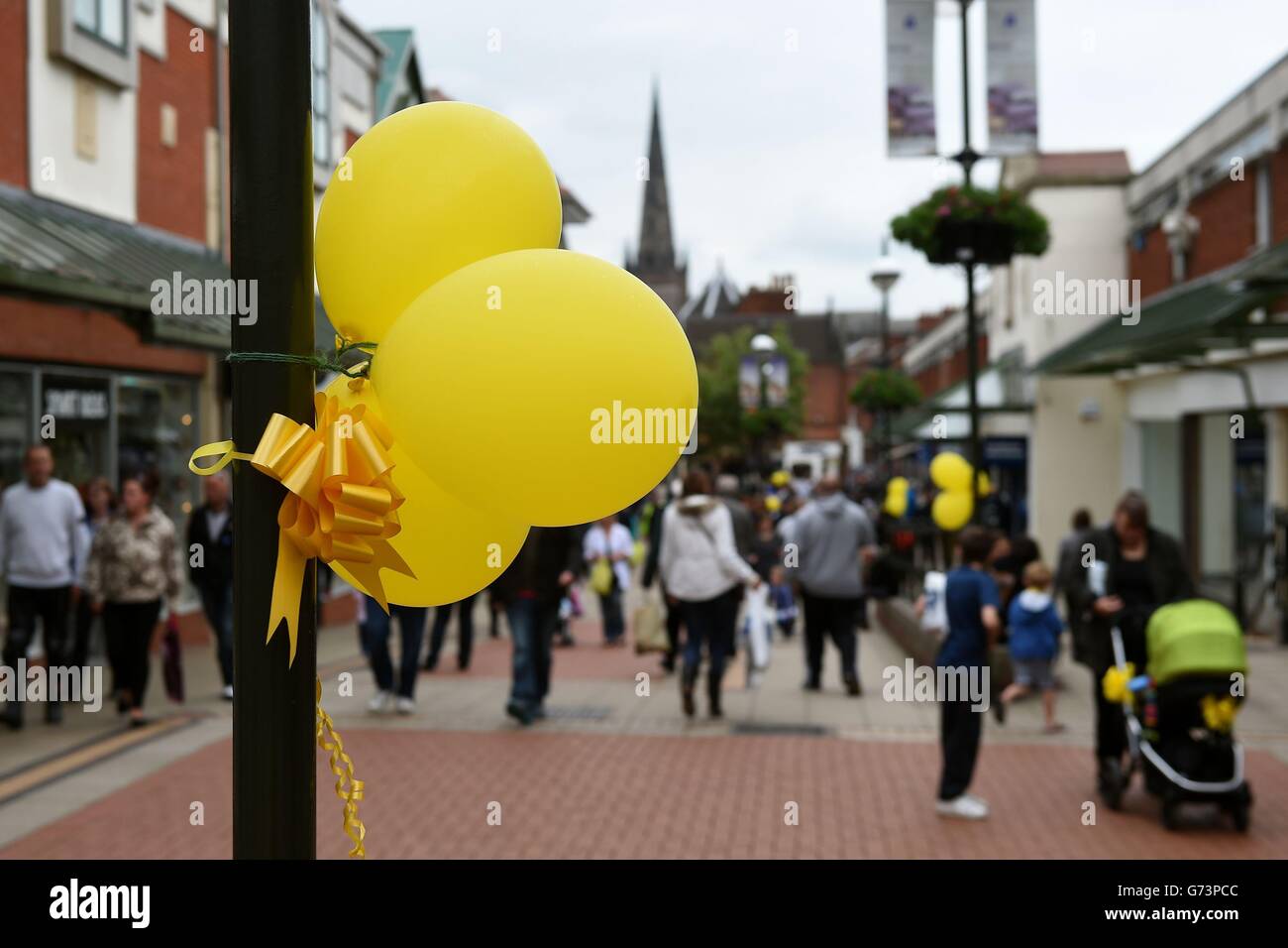 Yellow ribbons and balloons are placed all over Lichfield town centre
