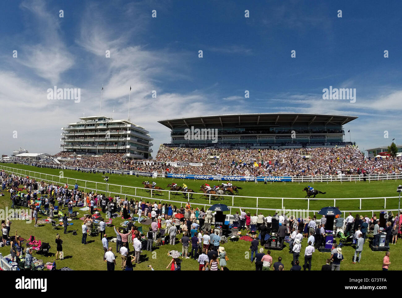 Thistle Bird ridden by James Doyle on their way to victory in the Princess Elizabeth Stakes during Investec Ladies Day at Epsom Downs Racecourse, Surrey. Stock Photo