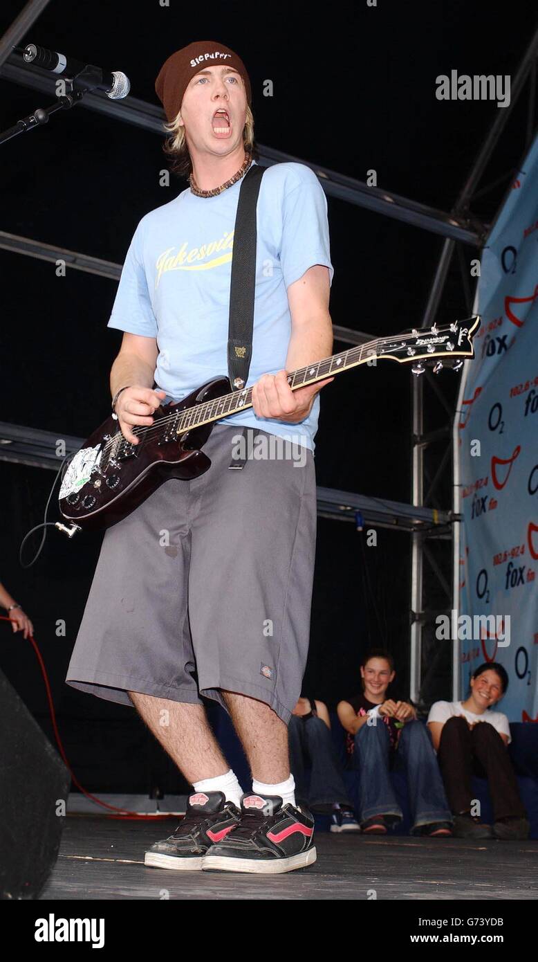 James Bourne from pop group Busted performing on stage at the Fox FM Party in the Park, held at South Park in Oxford. Stock Photo