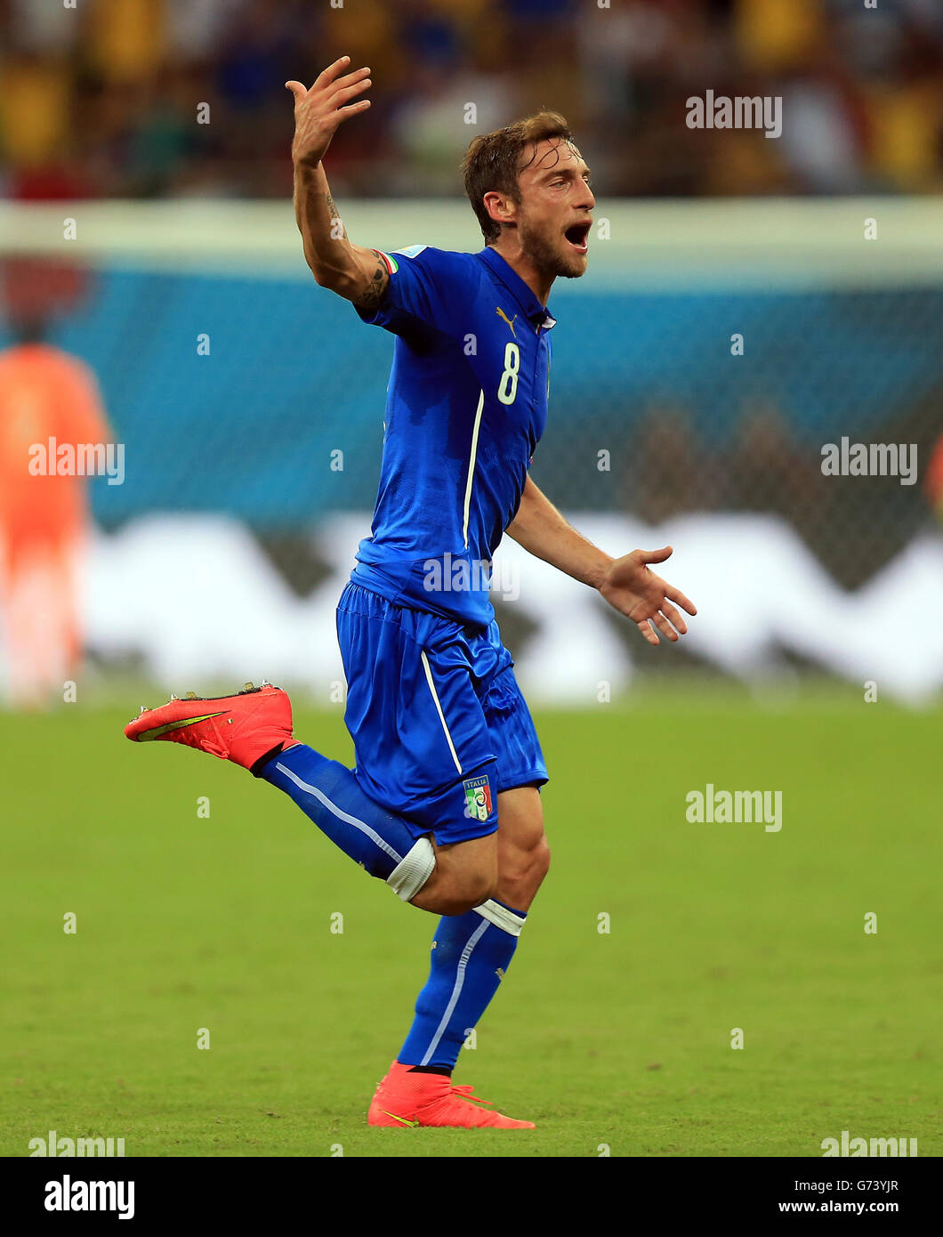 Italy's Claudio Marchisio celebrates scoring his side's first goal of the game during the FIFA World Cup, Group D match at the Arena da Amazonia, Manaus, Brazil. Stock Photo