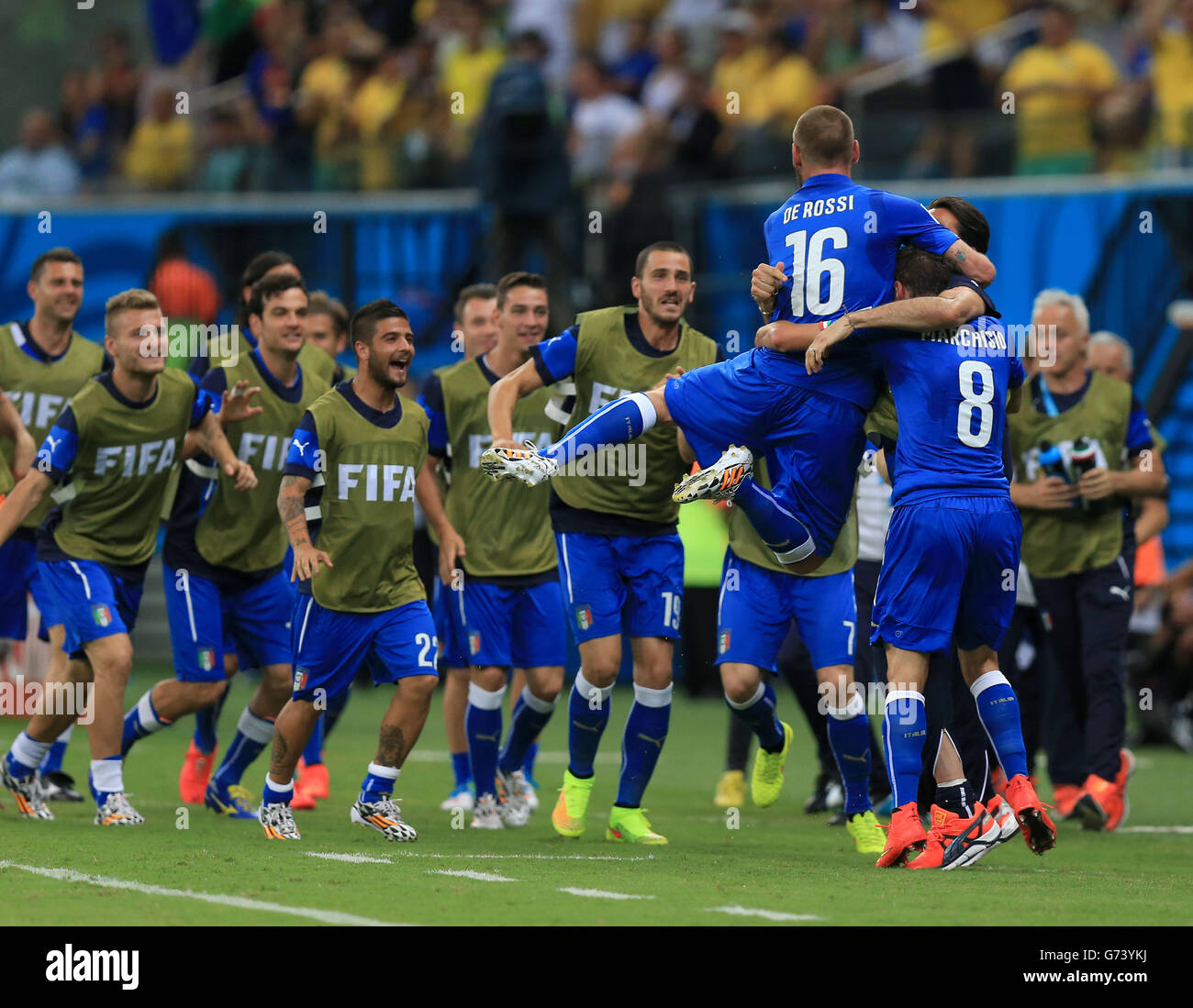 Italy's Claudio Marchisio (8) celebrates scoring his side's first goal of the game with team-mates during the FIFA World Cup, Group D match at the Arena da Amazonia, Manaus, Brazil. Stock Photo