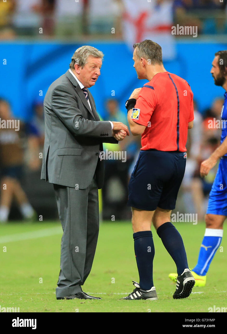 England manager Roy Hodgson (left) argues with referee Bjorn Kuipers (right) during the FIFA World Cup, Group D match at the Arena da Amazonia, Manaus, Brazil. Stock Photo