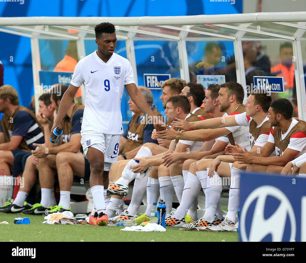 England's Daniel Sturridge shakes hands with his England team-mates after being substituted during the FIFA World Cup, Group D match at the Arena da Amazonia, Manaus, Brazil. Stock Photo