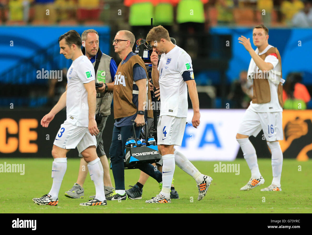 England's Steven Gerrard (centre) dejected after the final whistle during the FIFA World Cup, Group D match at the Arena da Amazonia, Manaus, Brazil. Stock Photo