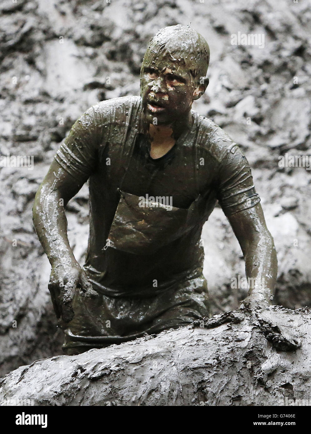 A competitor during the Tough Mudder event in Dalkeith Country Park near Edinburgh, Scotland. Stock Photo