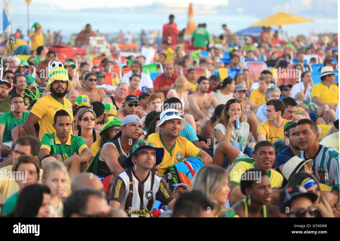 Brazil Fans watch the Brazil v Mexico match on a big screen on Copacabana Beach, Rio de Janeiro, Brazil. Stock Photo