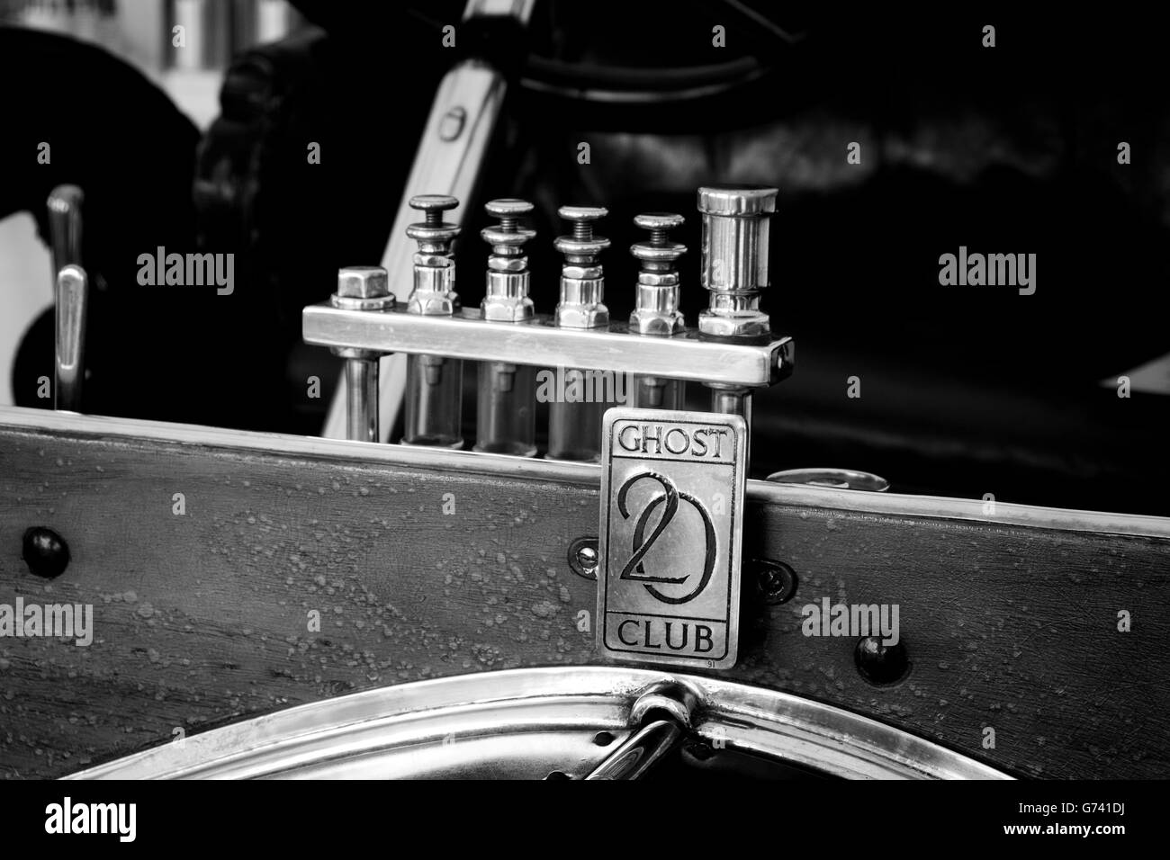 Details from the front of a vintage Rolls Royce featuring the Rolls Royce Ghost 20 Club Stock Photo