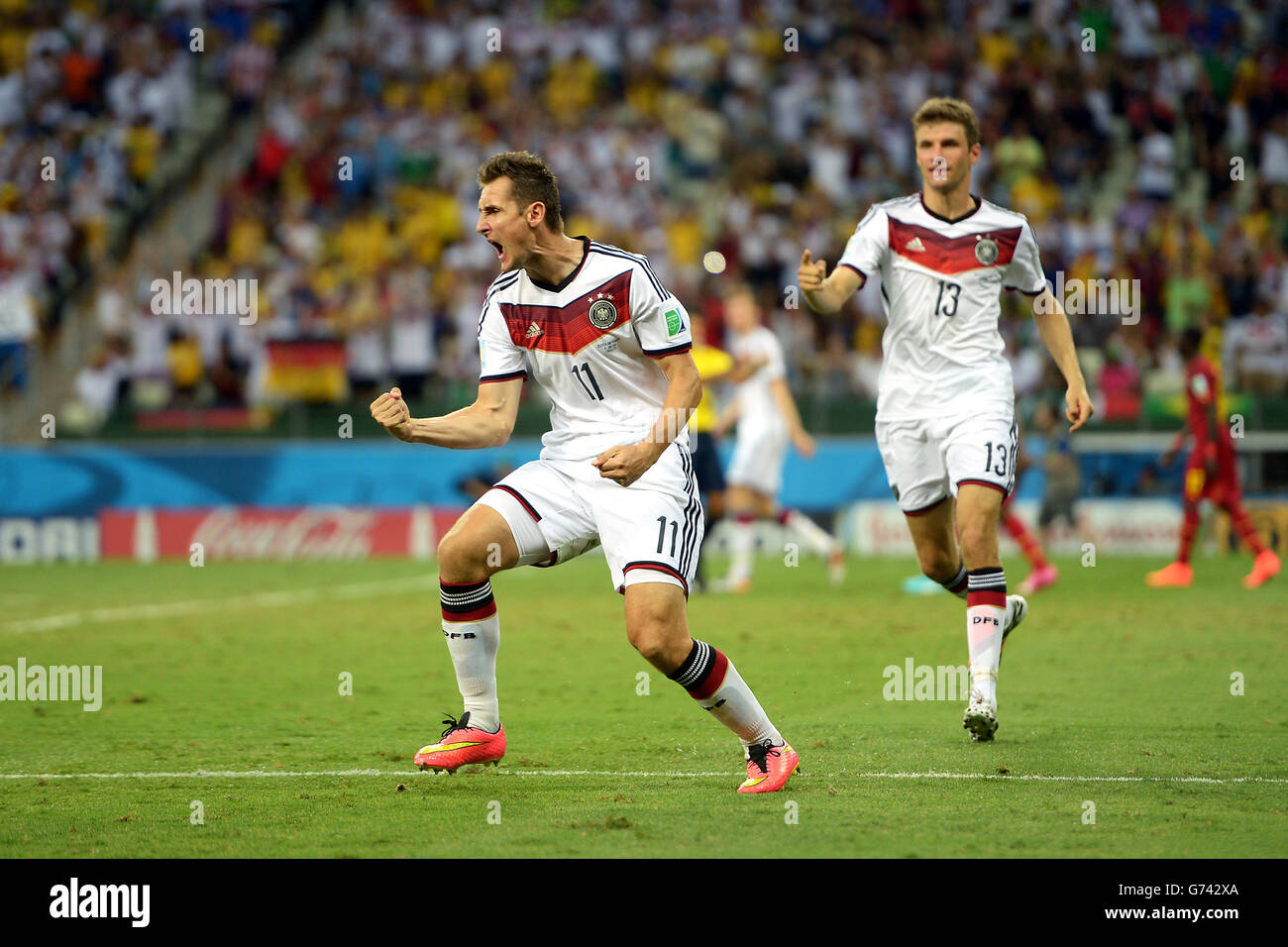 Soccer - FIFA World Cup 2014 - Group G - Germany v Ghana - Estadio Castelao. Germany's Miroslav Klose (left) celebrates scoring their second goal with teammate Thomas Muller Stock Photo
