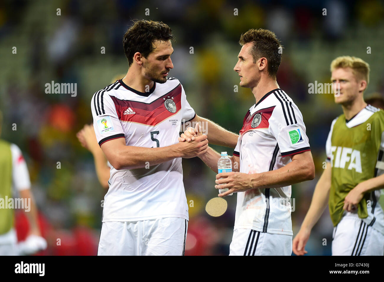 Soccer - FIFA World Cup 2014 - Group G - Germany v Ghana - Estadio Castelao. Germany's Mats Hummels (left) congratulates teammate Miroslav Klose on his record equaling goal Stock Photo