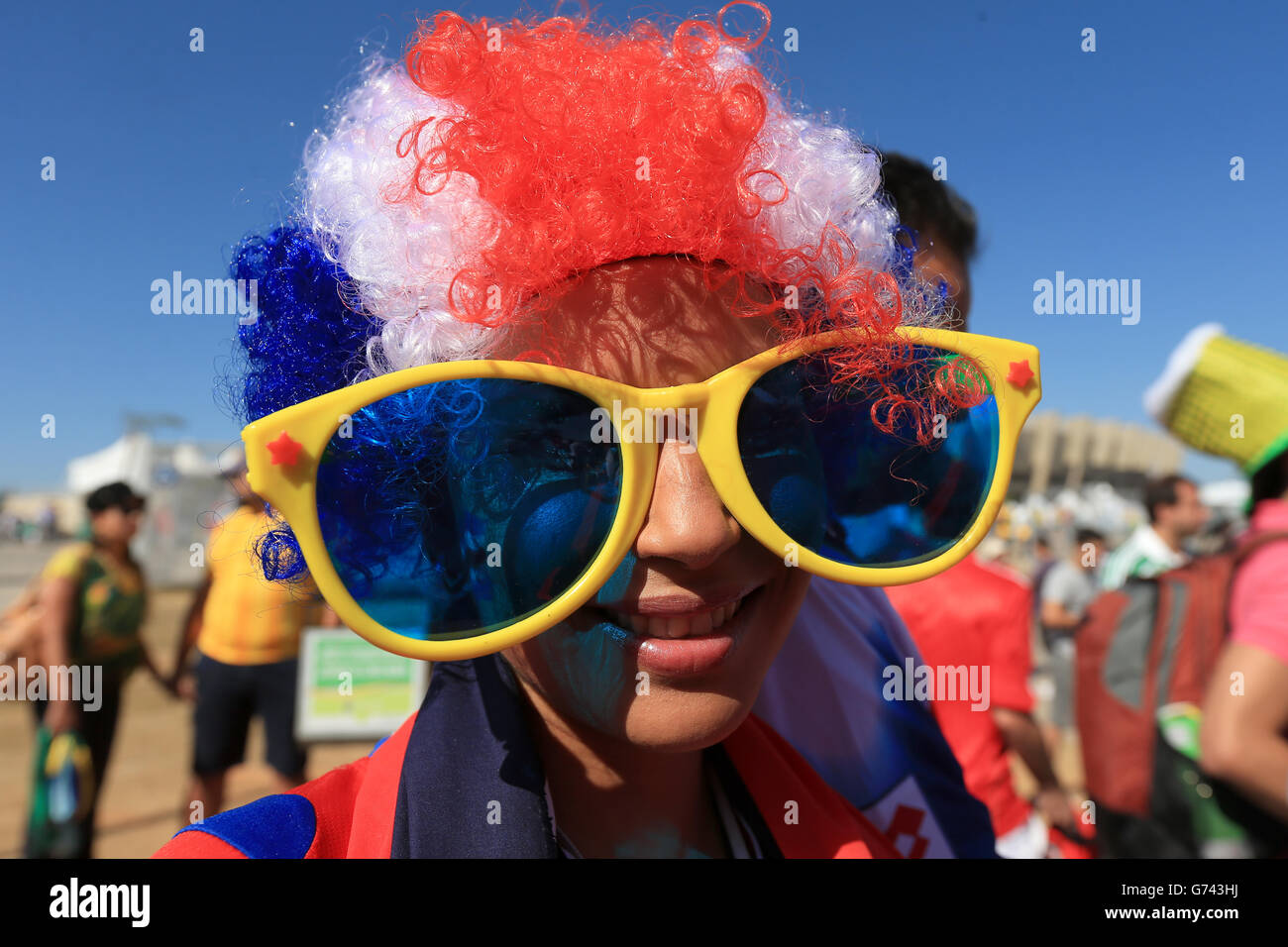 A Costa Rica fan poses for a photo outside the stadium before the FIFA World Cup, Group D match at the Estadio Mineirao, Belo Horizonte, Brazil. Stock Photo