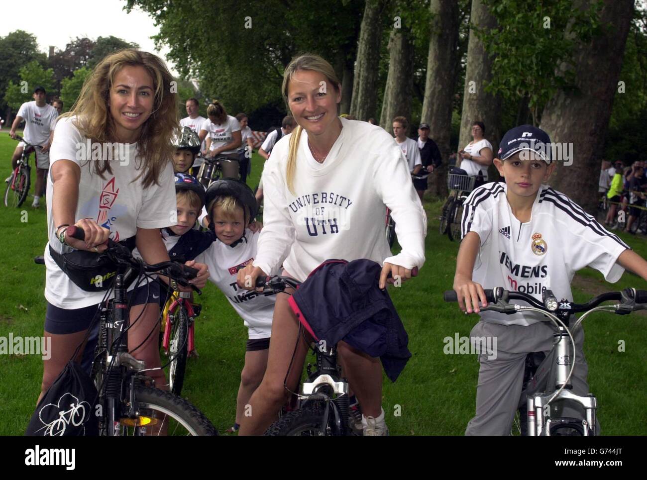 A charity bike a thon in London in aid of Leukaemia research. With Michelle Lineker and her sons Angus (on her bike), Tobias on his bike and George (far right) and Ali Cockayne and her son Henry. Stock Photo