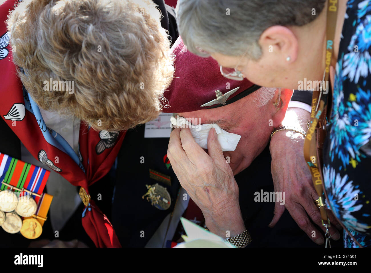 William Ness, 12th Yorkshire Parachute Battalion, is overcome during a commemorative ceremony at Memorial Pegasus near Ouistreham, France, as veterans mark the 70th anniversary of the D-Day landings during World War II. Stock Photo