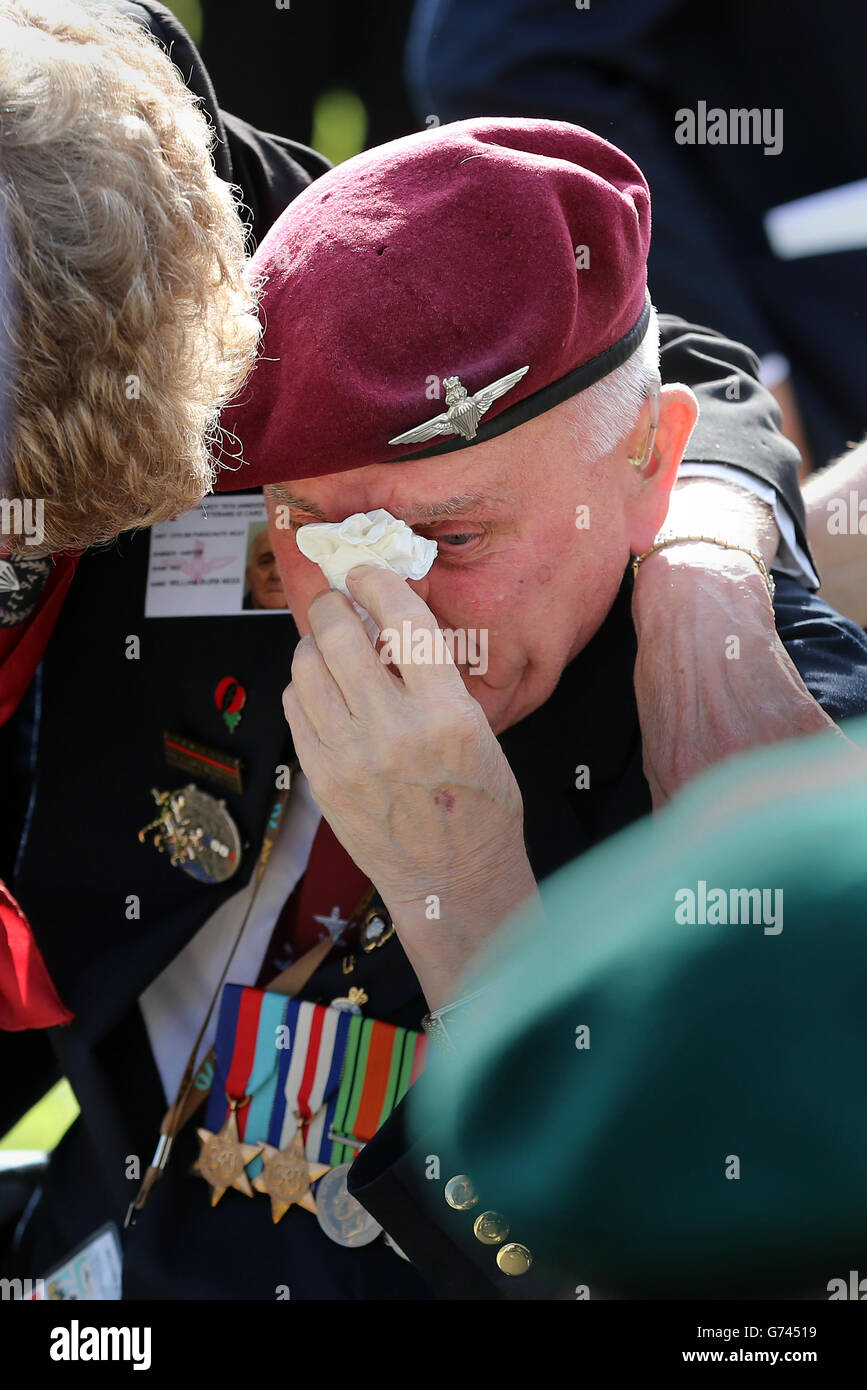 William Ness, 12th Yorkshire Parachute Battalion, is overcome during a commemorative ceremony at Memorial Pegasus near Ouistreham, France, as veterans mark the 70th anniversary of the D-Day landings during World War II. Stock Photo