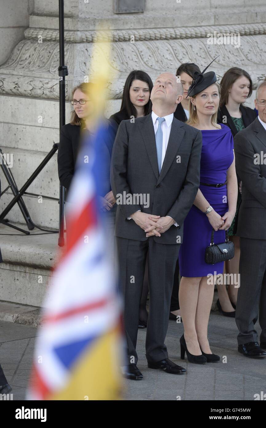 Foreign Secretary William Hague and his wife Ffion Jenkins at the Arc de Triomphe, Paris, as they await the arrival of Queen Elizabeth II during a State visit to France. Stock Photo