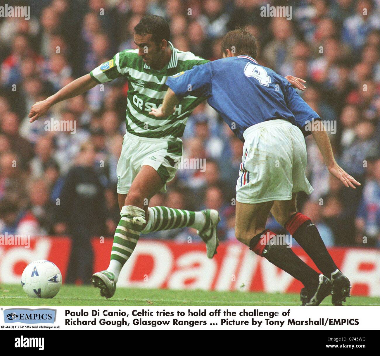Paolo Di Canio, Celtic tries to hold off the challenge of Richard Gough, Glasgow Rangers ... Picture by Tony Marshall/EMPICS Stock Photo