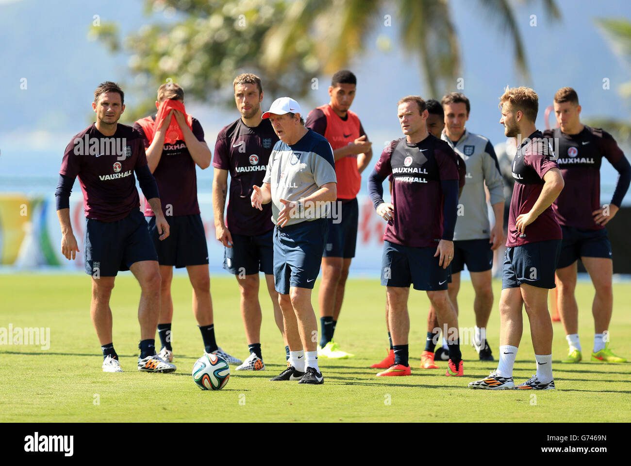 Soccer - FIFA World Cup 2014 - Group D - England v Italy - England Training Session and Press Conference - Urca Military Trai.... England manager Roy Hodgson speaks to his team during the training session at Urca Military Training Ground, Rio de Janeiro, Brazil. Stock Photo