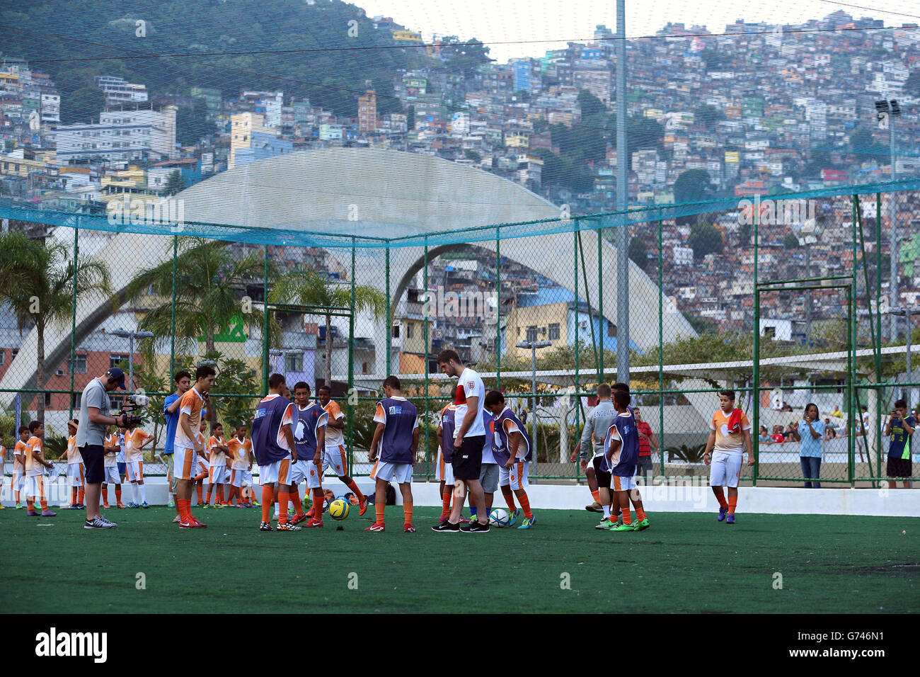 England's Fraser Forster during a visit to the Complexo Esportivo da Rocinha, Rio de Janeiro, Brazil. Stock Photo